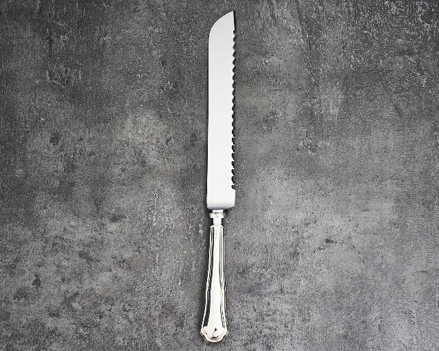Coltello panettone argento 20 grammi in stile barocchino usato ricondizionato
