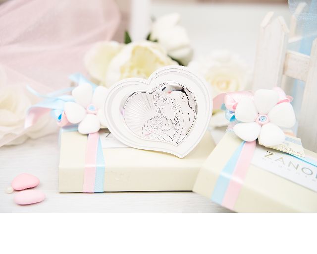 Madonna with child white with wooden back and sugared almonds