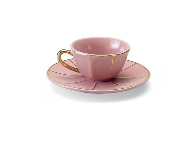 Tazza caffè la tavola scomposta porcellana con piattino rosa