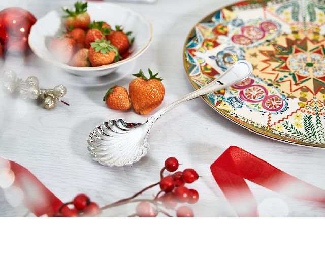 Strawberries spoon silver in english style