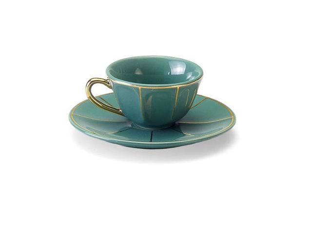 Tazza caffè la tavola scomposta porcellana con piattino verde