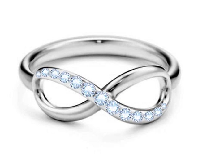Anello acciaio con infinito e zirconi