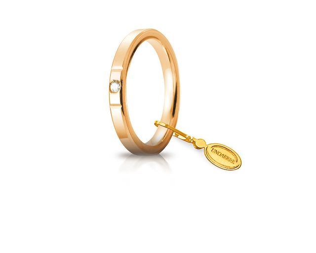 Fede cerchio di luce oro 750‰ con diamante